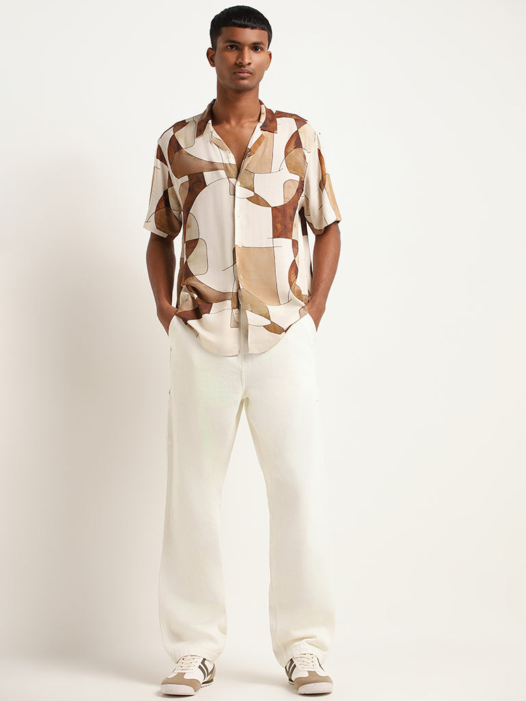 Buy Nuon Cream Relaxed Fit Mid Rise Jeans from Westside