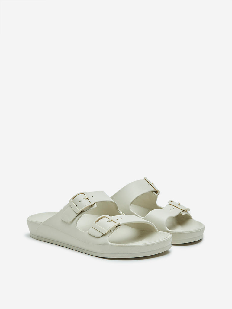 Ivory flip flops on sale