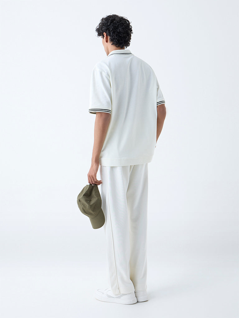 Westside Studiofit Men's White Relaxed-Fit Cotton-Blend Polo T-Shirt for Sports Wear Back View