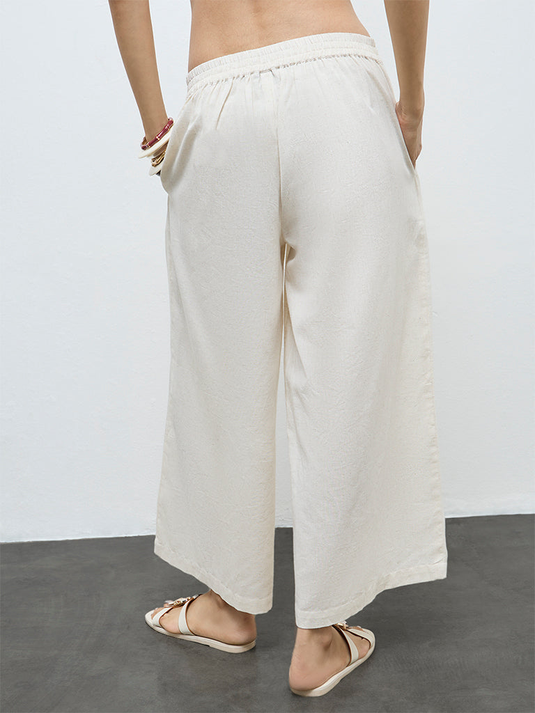 Utsa Off-White Floral Embroidered Cotton-Blend Pants