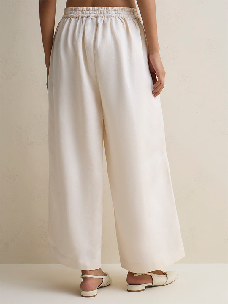 Zuba Off-White Floral Embroidered Linen-Blend Pants