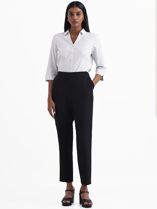 Buy Gia Black Solid Trousers from Westside