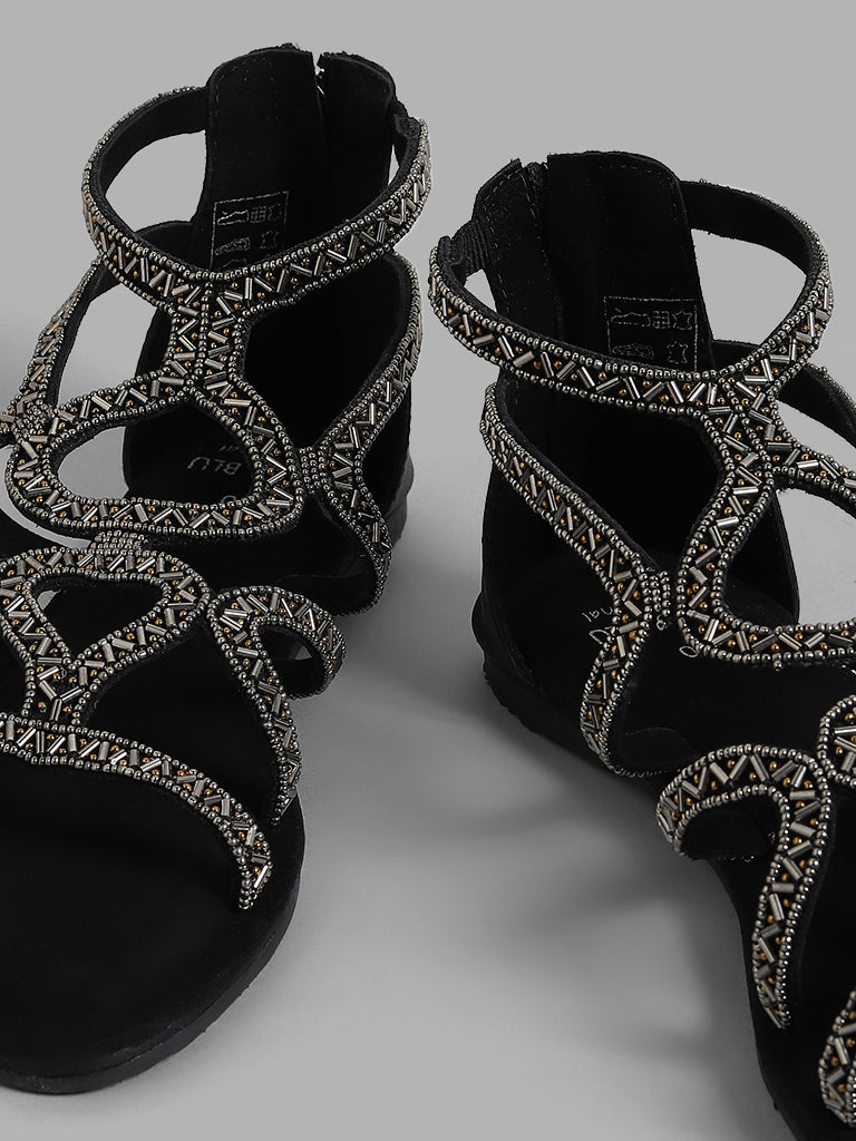 SHINEE EMBELLISHED FLAT SANDAL IN BLACK