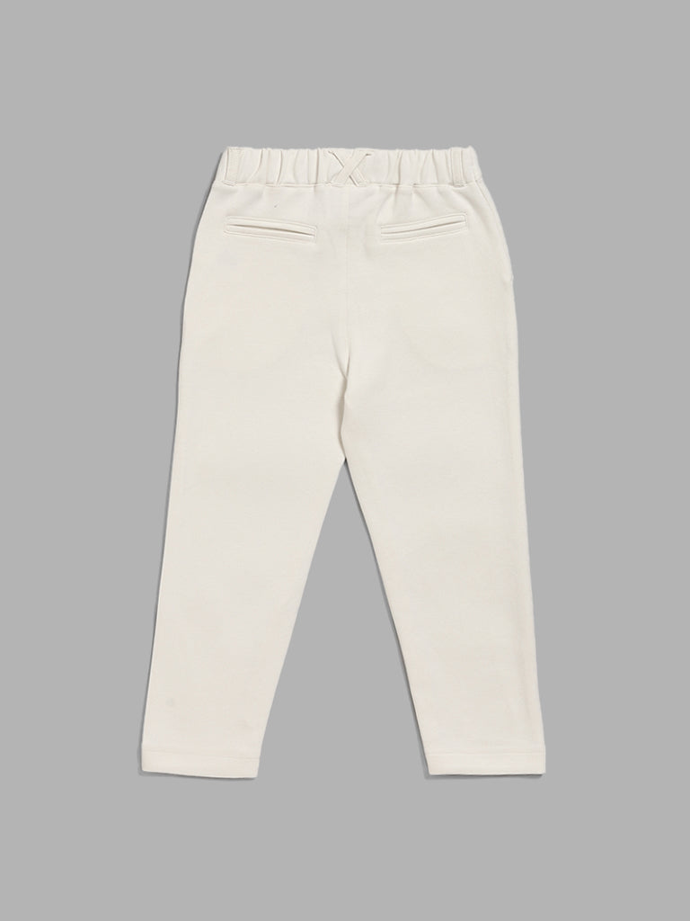 Buy Tales & Stories Kids White Solid Trousers for Boys Clothing Online @  Tata CLiQ