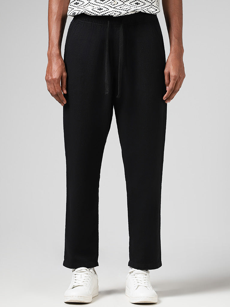 Buy ETA Self Black Relaxed Fit Chinos from Westside