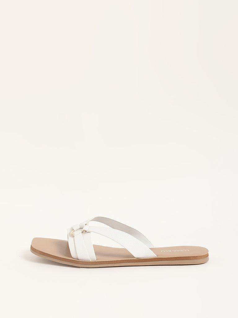 White and best sale tan flip flops