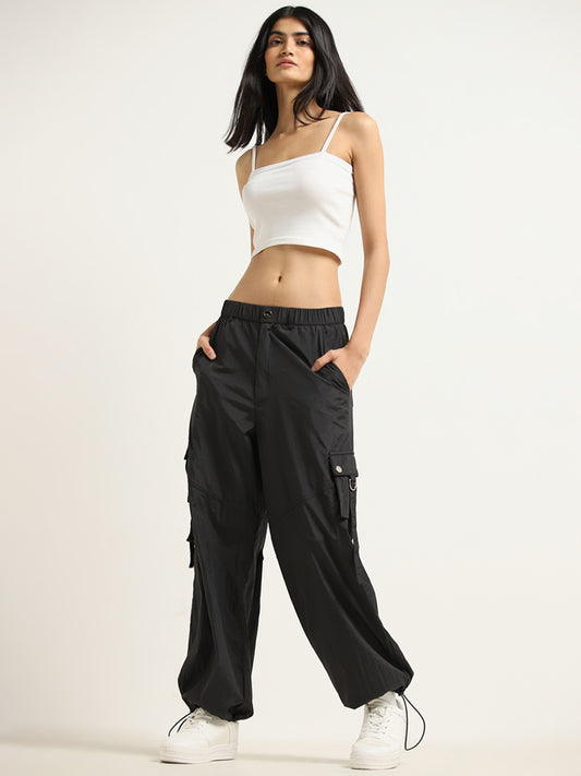 Buy Gia Solid Black Mid Rise Wide Leg Trousers from Westside