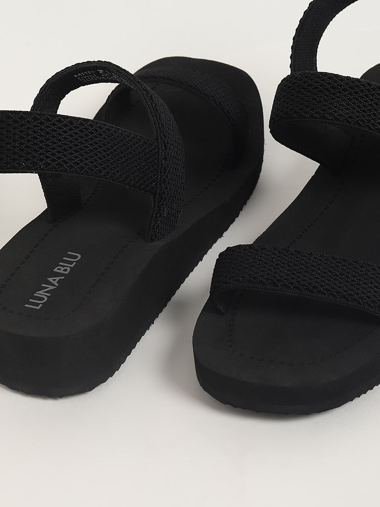 Black strappy best sale flip flops