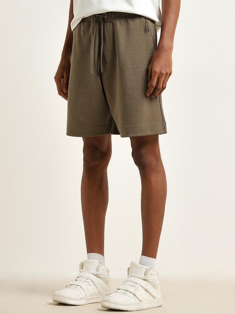 Buy Studiofit Olive Relaxed Fit Mid Rise Shorts from Westside