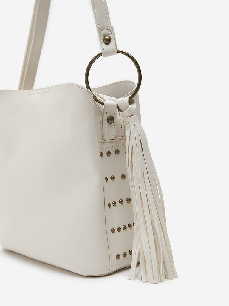 Buy Westside Off White Tassel Detailed Sling Bag from Westside