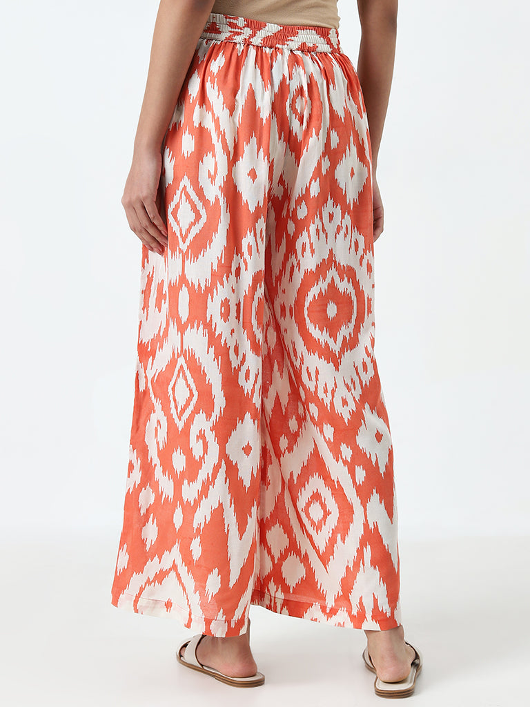 Utsa Orange Ikat Printed High-Rise Cotton Blend Palazzos