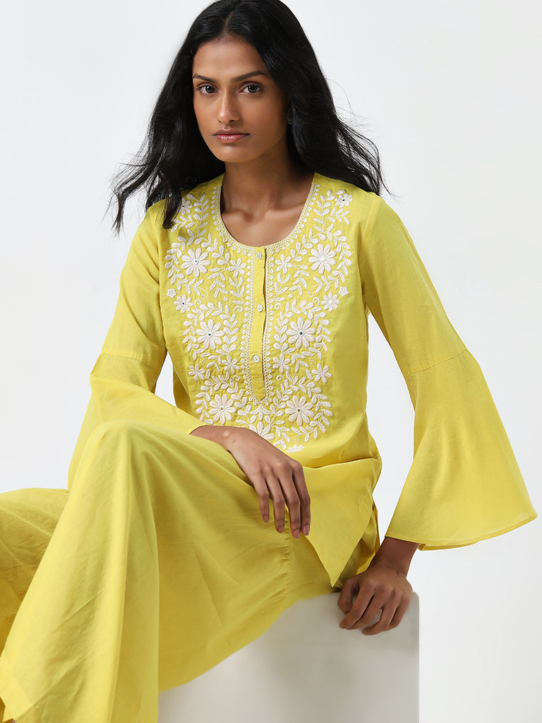 Utsa Yellow Embroidered Straight Cotton Kurti