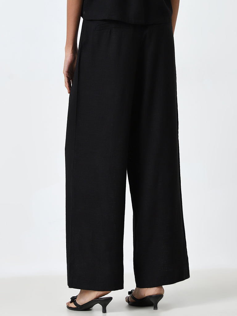 LOV Black High-Rise Asymmetrical Trousers