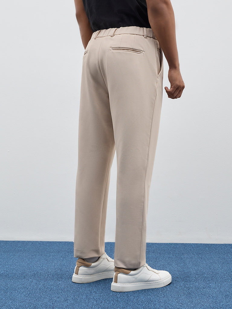 WES Formals Light Beige Solid Relaxed Mid-Rise Trousers