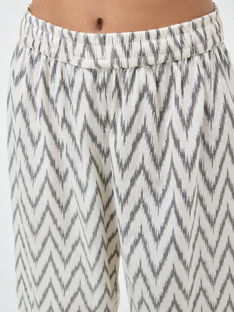 Utsa White Chevron Ikat-Printed Cotton Blend Ethnic Pants