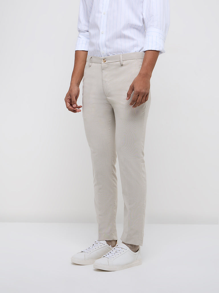 WES Formals Beige Solid Ultra-Slim Fit Mid-Rise Trousers