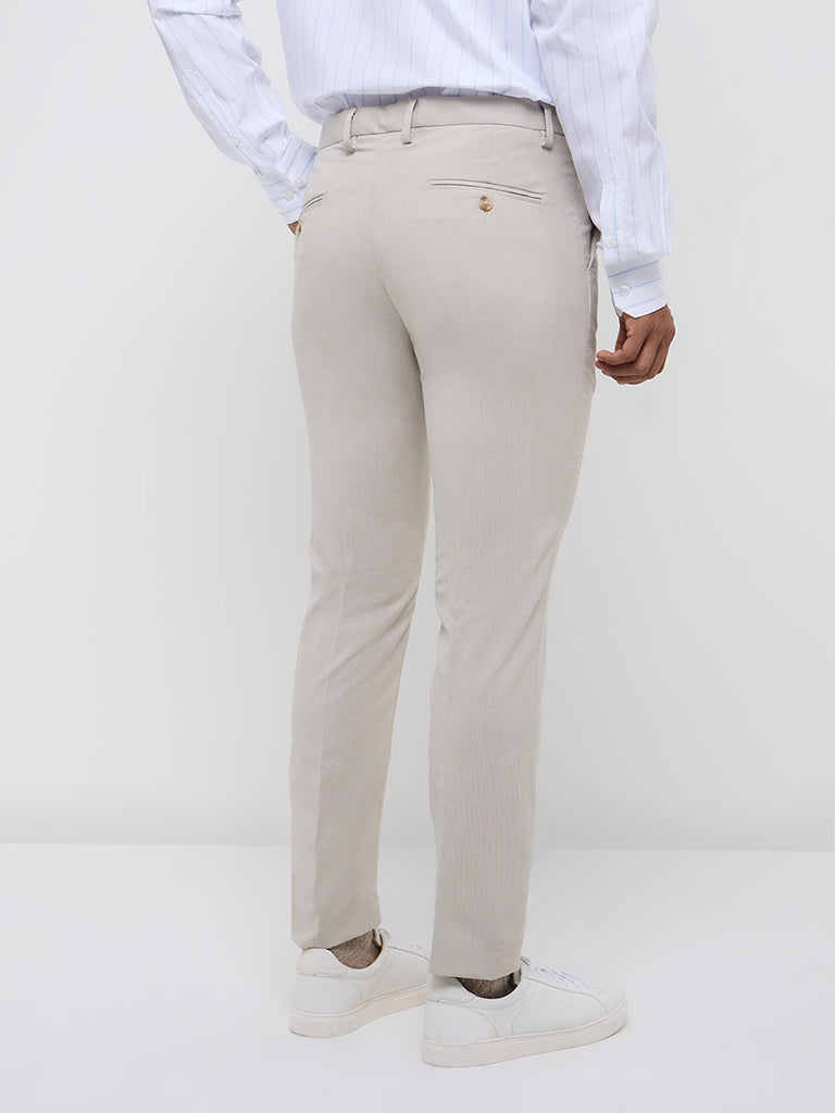 WES Formals Beige Solid Ultra-Slim Fit Mid-Rise Trousers