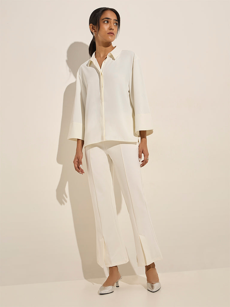 Wardrobe Off-White Slit-Detailed High-Rise Bootcut Trousers