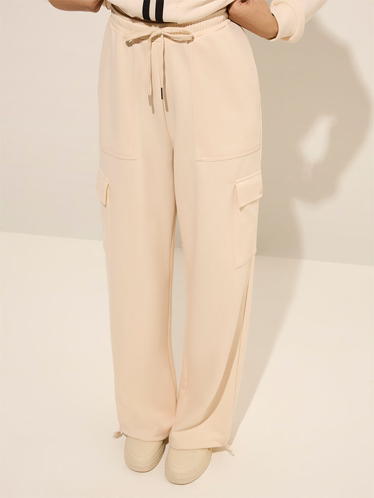 Studiofit Beige Solid High-Rise Cargo Track Pants