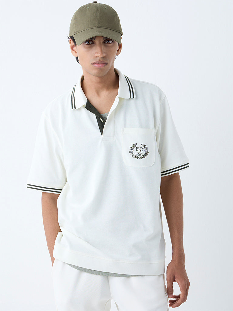 Westside Studiofit Men's White Relaxed-Fit Cotton-Blend Polo T-Shirt for Sports Wear Front View