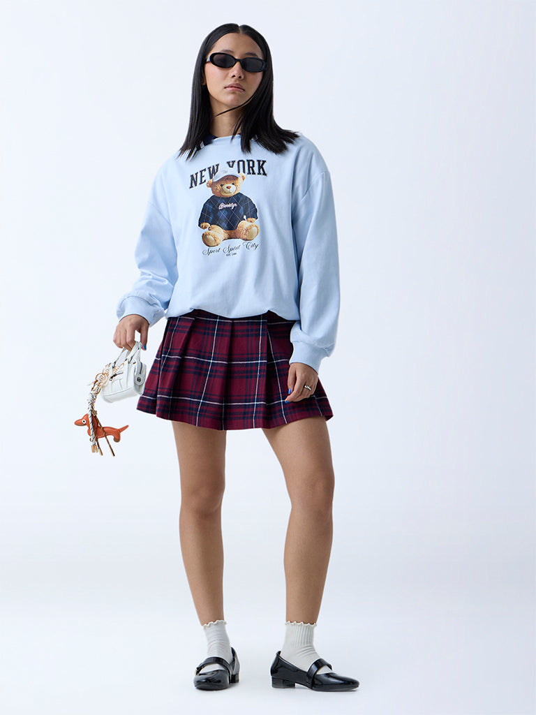 Westside Nuon Women's Light Blue Teddy Printed Cotton Sweatshirt for Winter Wear Front View