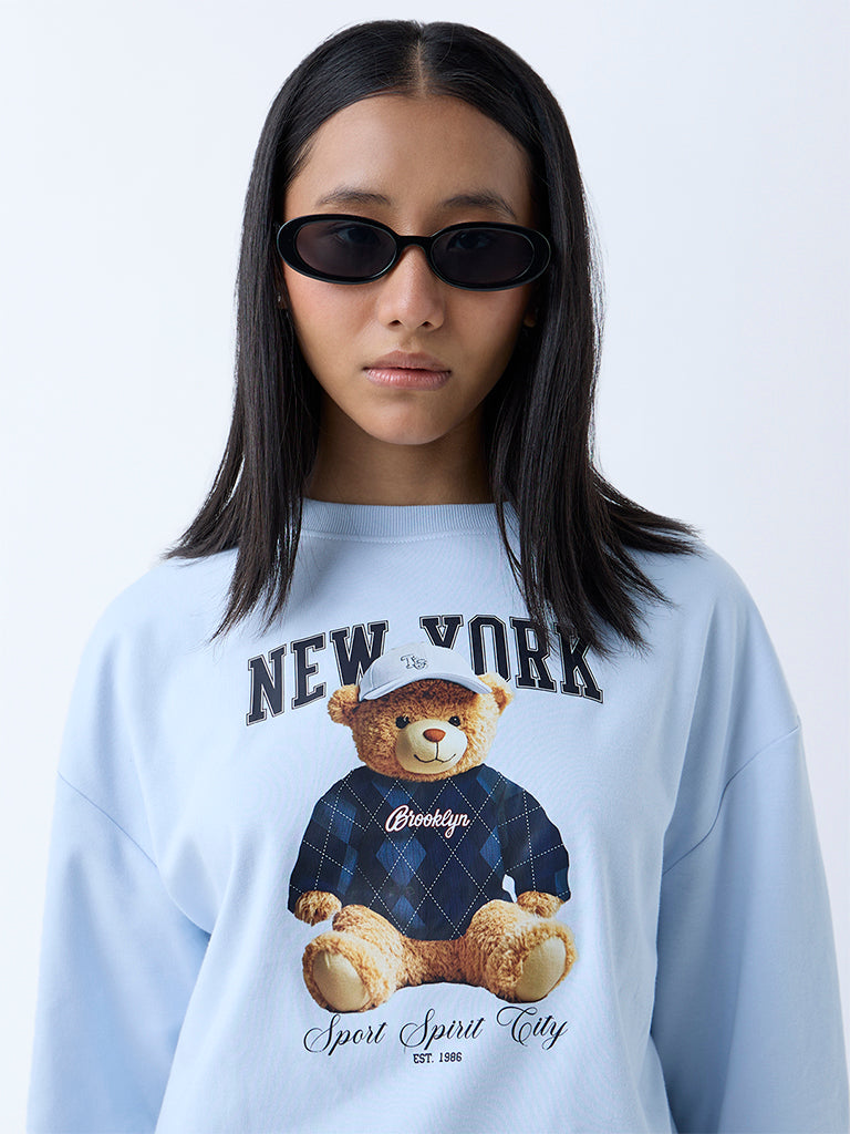 Westside Nuon Women's Light Blue Teddy Printed Cotton Sweatshirt for Winter Wear Zoomed View