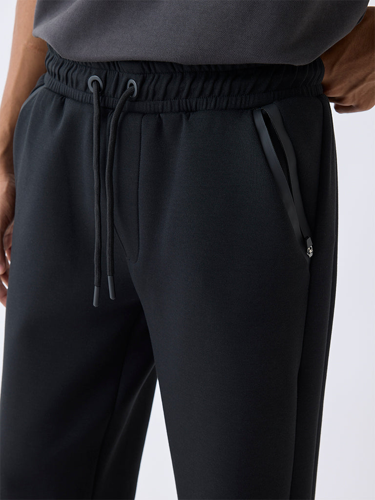 Studiofit Black Solid Relaxed-Fit Mid-Rise Track Pants