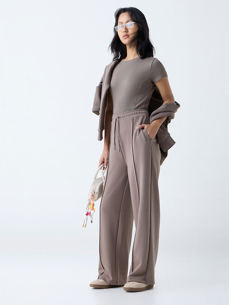 Westside Studiofit Women's Brown Solid High-Rise Track Pants for Sports Wear Full View