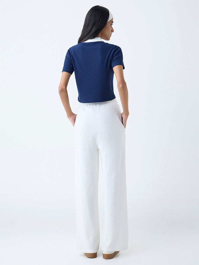 Westside Studiofit Women's Navy Ribbed-Textured T-Shirt for Sports Wear Back View