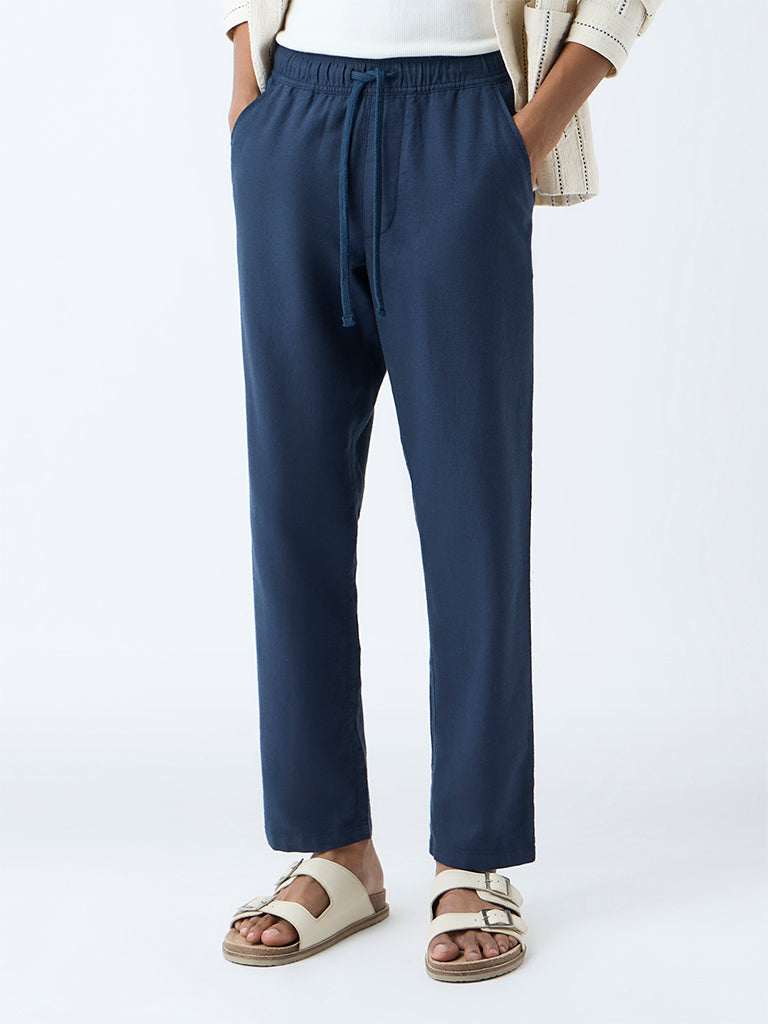 Westside ETA Men's Dark Blue Solid Relaxed-Fit Mid-Rise Cotton Pants for Casual Wear Front view