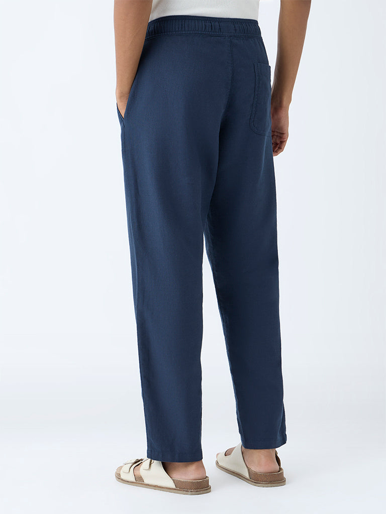 Westside ETA Men's Dark Blue Solid Relaxed-Fit Mid-Rise Cotton Pants for Casual Wear Back View