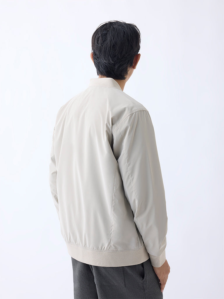 Westside Studiofit Men's Beige Solid Relaxed-Fit Jacket for Sports Wear Back View