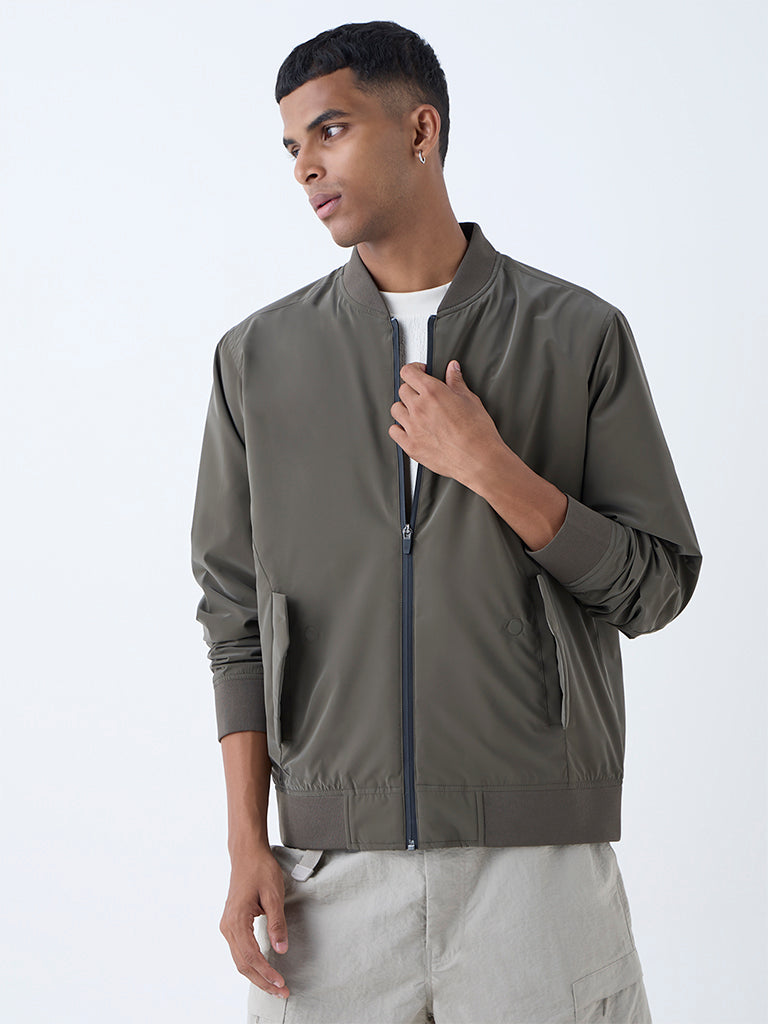 Westside Studiofit Men's Olive Solid Relaxed-Fit Bomber Jacket for Sports Wear Front view