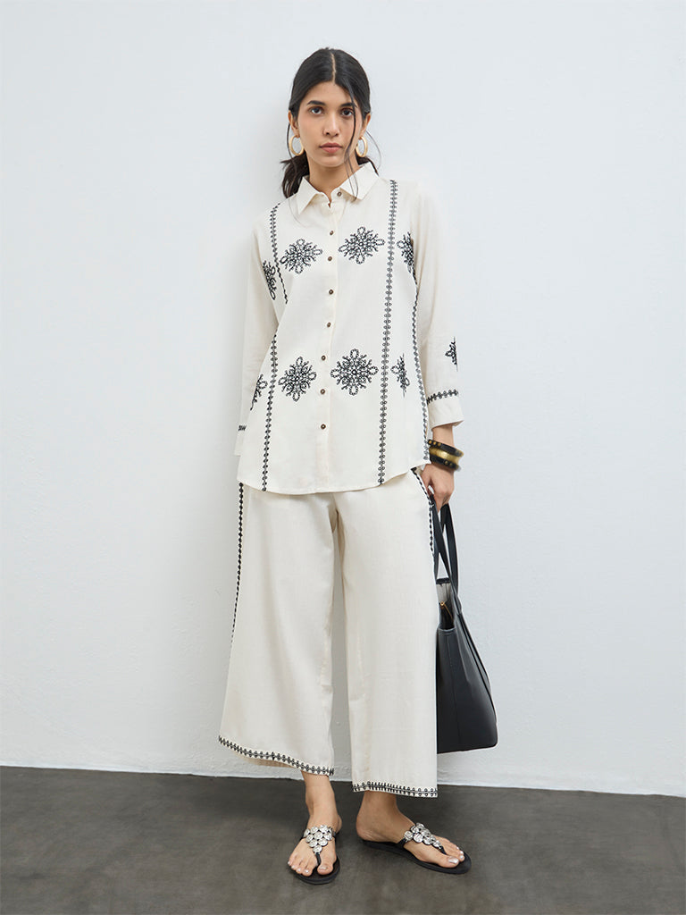 Utsa Off-White Embroidered Cotton-Blend Pants