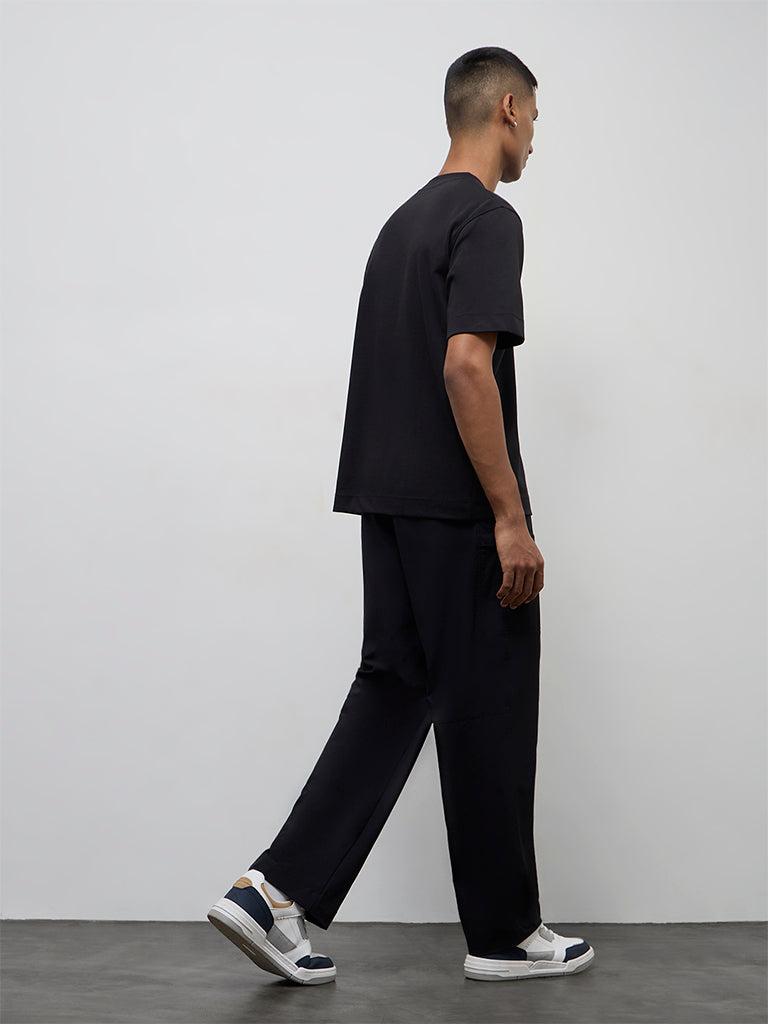 Nuoflexx Black Solid Relaxed-Fit Mid-Rise Pants