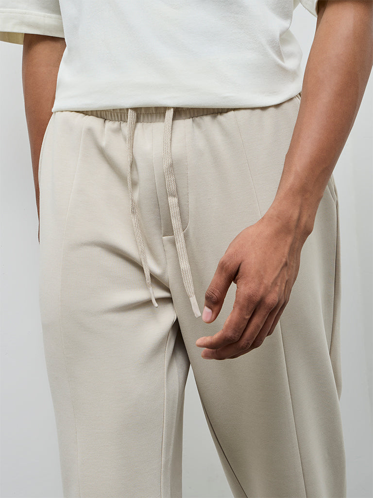 Nuoflexx Beige Relaxed-Fit Mid-Rise Pants