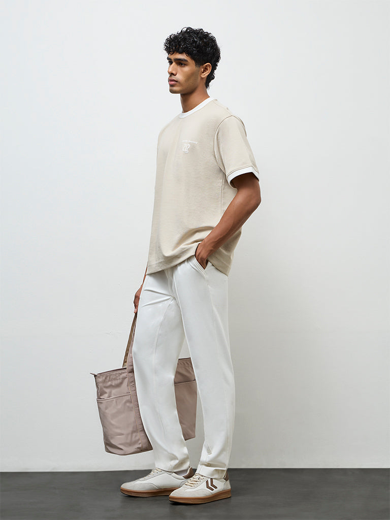Nuoflexx Beige Text Printed Relaxed-Fit T-Shirt