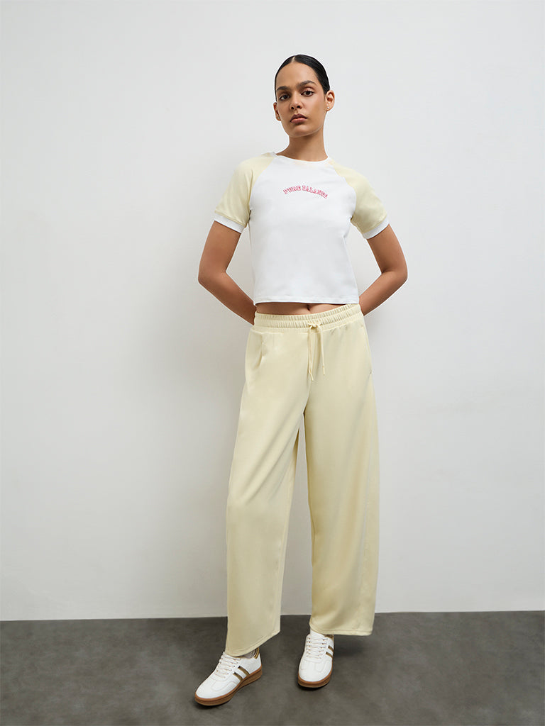 Nuoflexx Off-White Text Printed Cotton-Blend T-Shirt