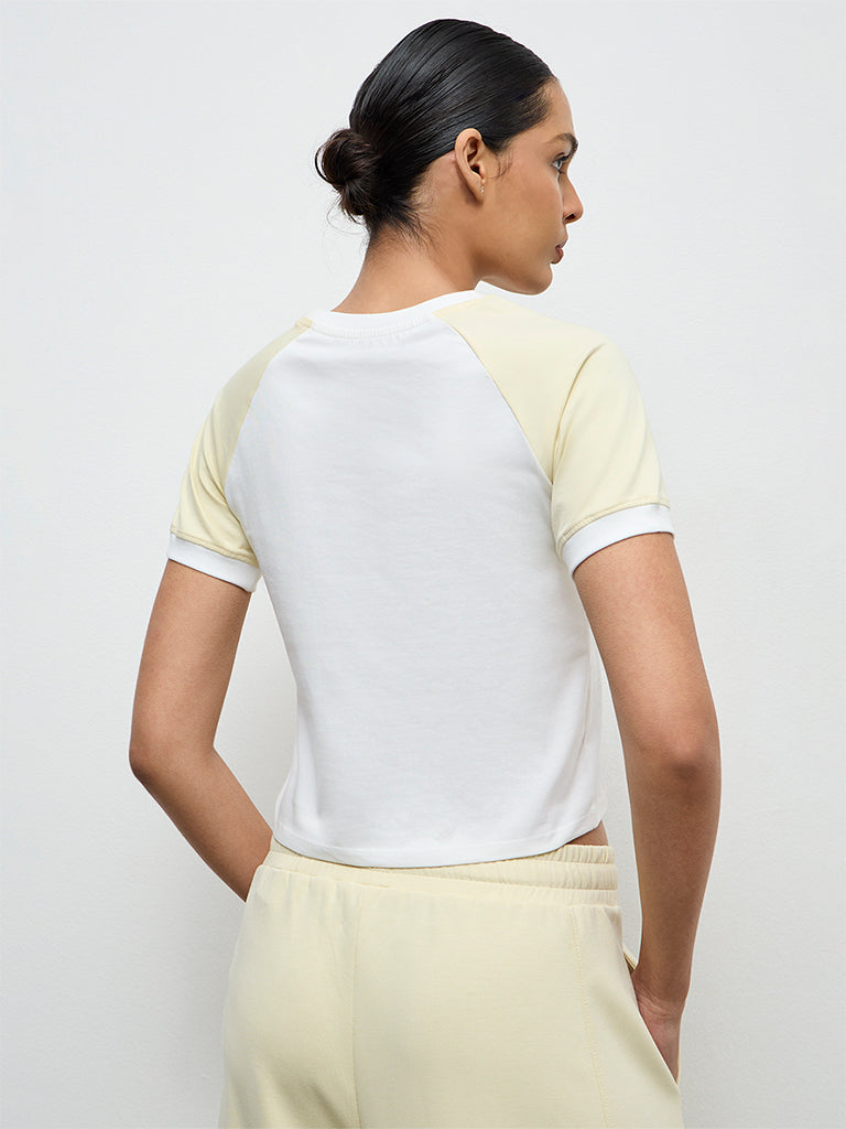 Nuoflexx Off-White Text Printed Cotton-Blend T-Shirt
