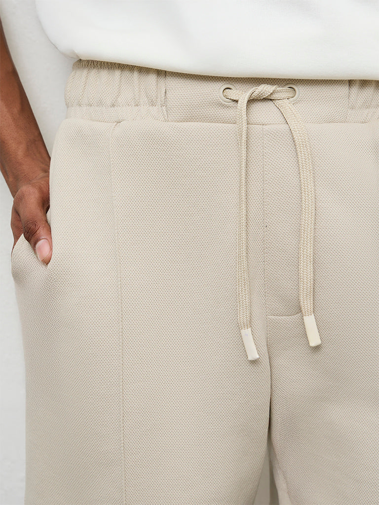 Nuoflexx Beige Textured Relaxed Fit Mid-Rise Shorts