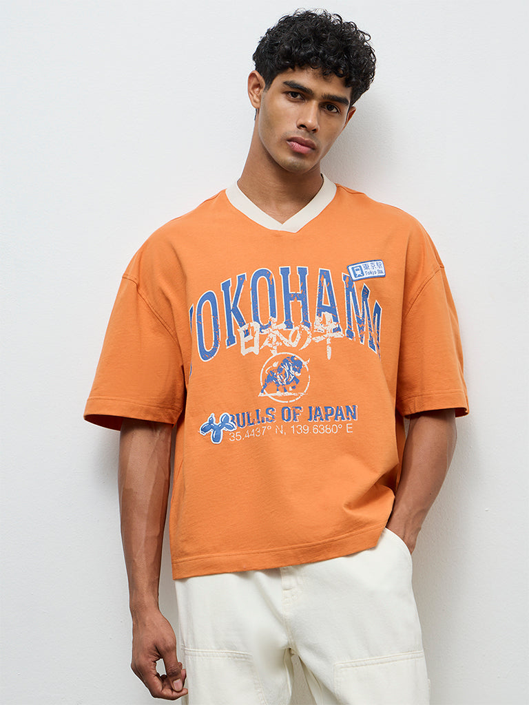 Nuon Orange Text Printed Oversized T-Shirt