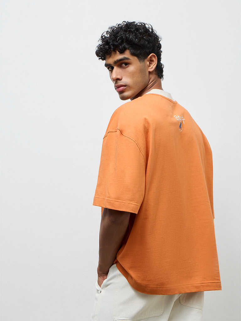 Nuon Orange Text Printed Oversized T-Shirt
