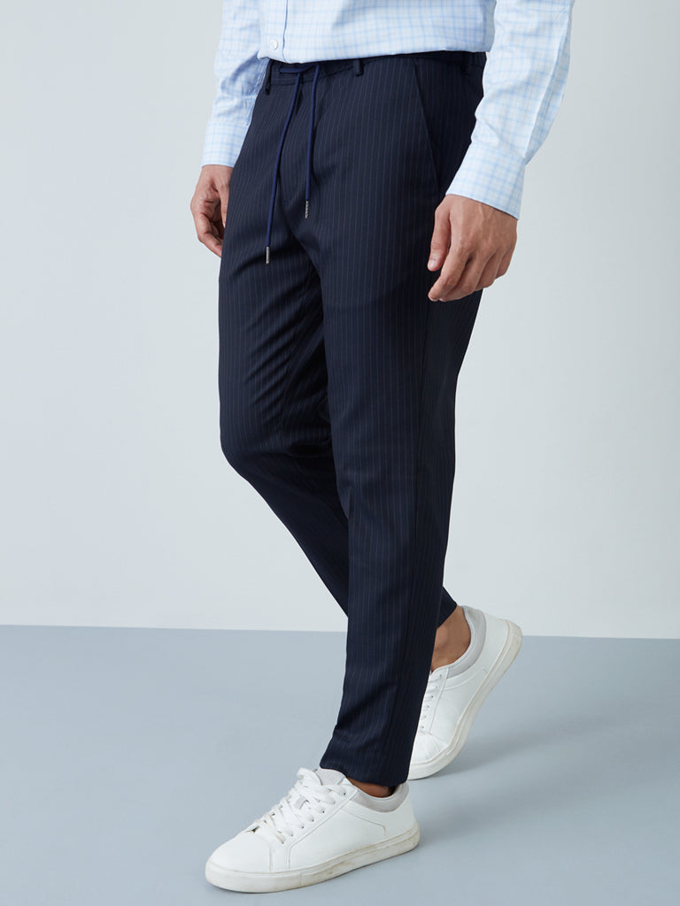 Shop WES Formals Navy Striped CarrotFit Trousers Online  Westside
