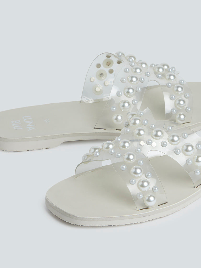 White pearl store flip flops