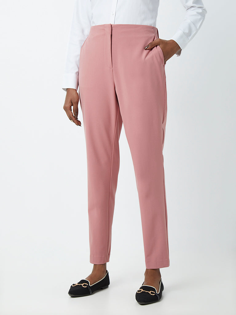 Tapered trousers  PinkChecked  Ladies  HM IN